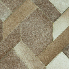 Crossed BEI Cowhide Rug